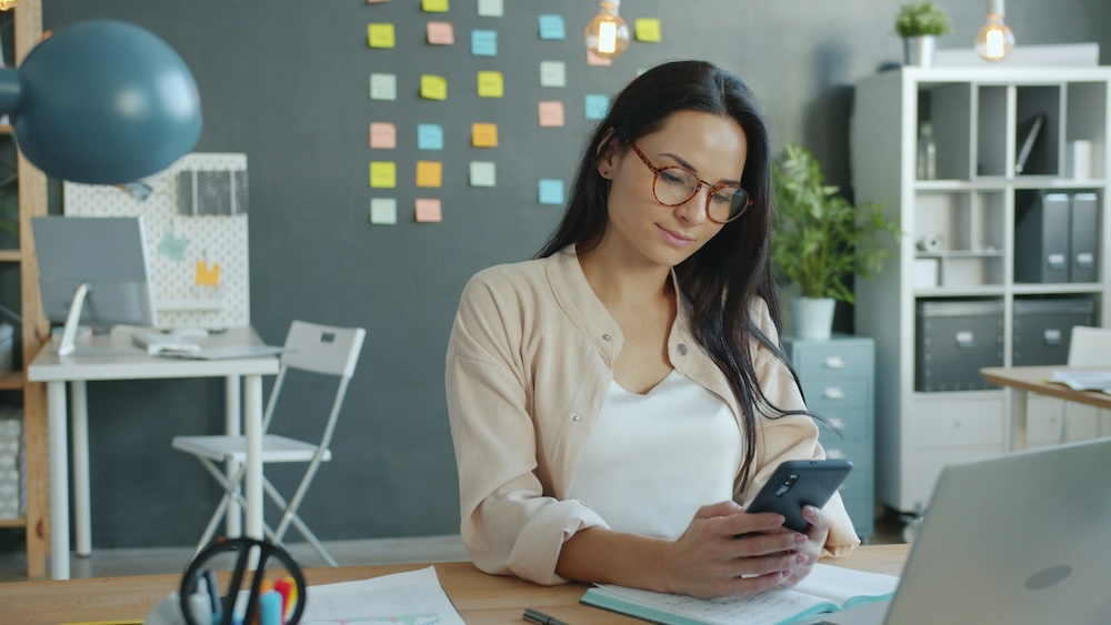 person smiling at small business website