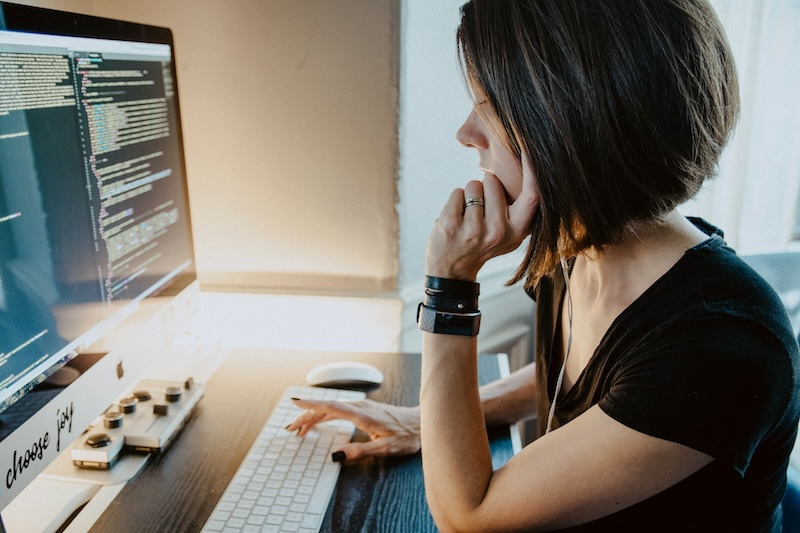 person researching at computer