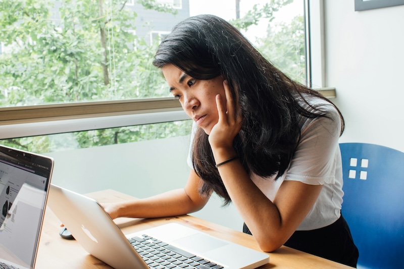 person looking frustrated at computer